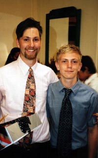 Niels and Kurt Waechter, his 5th and 6th-grade teacher, at graduation 